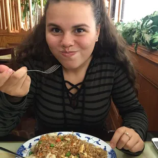 a woman eating a meal