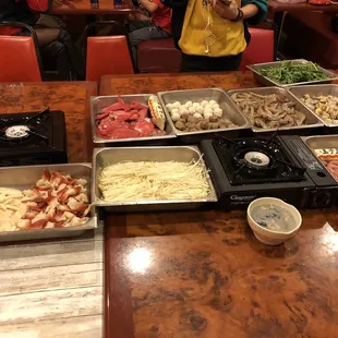 a variety of food being prepared on a table
