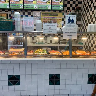 a buffet with a variety of food items