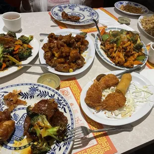 Broccoli beef, orange chicken and schezuan chicken.