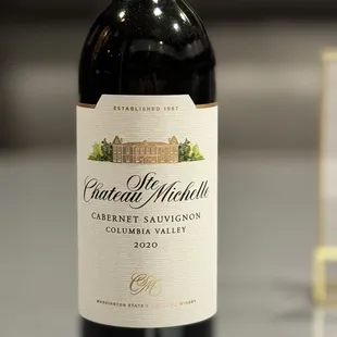 a bottle of wine on a table