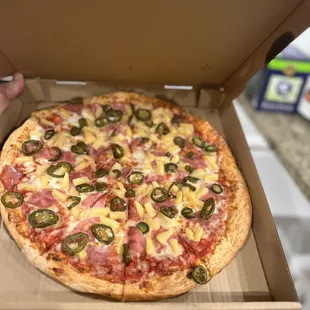 Pineapple  pizza  with Canadian Ham and Jalapeño