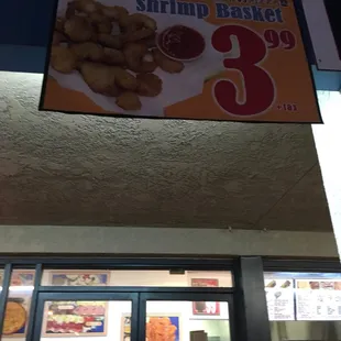 Shrimp basket $3.99 hanging outside next to the EBT cash accepted sign
