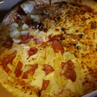 2 topping, extra cheese, a little under $9. Didnt like it. The one on highland is way better