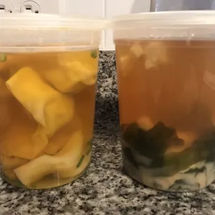 Large wonton soup on the left, large miso soup on the right