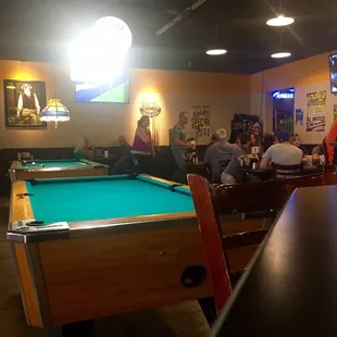 a pool table in a restaurant