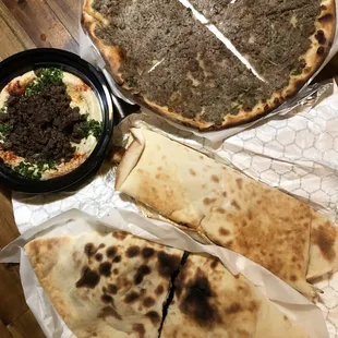 Safiha Taraboulsi Flatbread, hummus/ground beef plate, Labani/chicken wrap, Falafel Pie/Cheese Flatbread