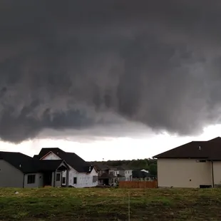 a wall cloud approaching a home