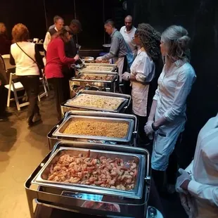 a buffet of food being served