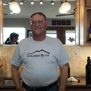 a man standing in a kitchen