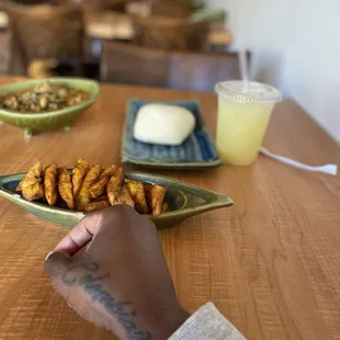 Plantains, Egusi with Fufu, and ginger  drink