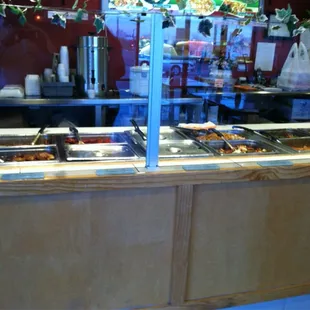 a buffet with a variety of food items