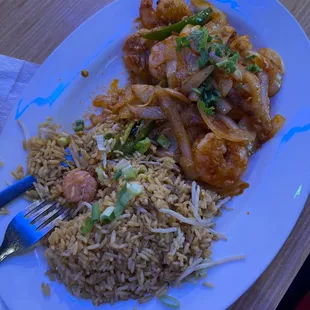 a plate of rice and shrimp