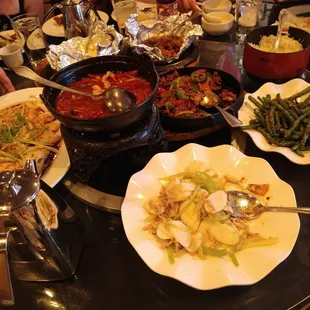 a table full of asian food