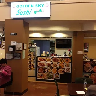 a woman sitting at a table