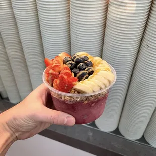 Brazilian Acai Bowl with banana, strawberry, blueberry and peanut butter toppings