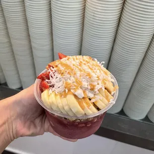 Brazilian Acai Bowl with banana, strawberry, blueberry, coconut and peanut butter toppings