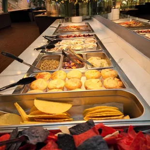 a buffet with many different types of food