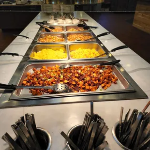 a buffet with many different types of food