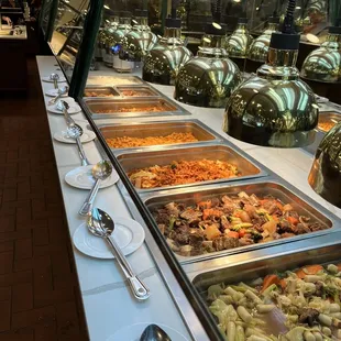 a buffet with many different types of food