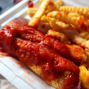 Hot fish with ketchup and hot sauce