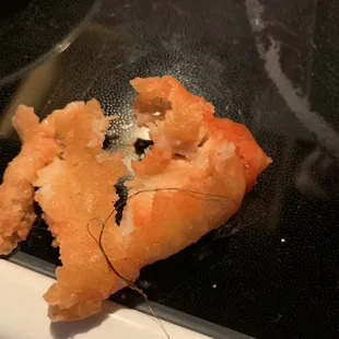 Sweet and sour chicken with brown hair