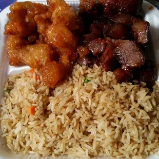 Combo B: fried rice, orange chicken, and BBQ pork.
