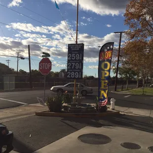 a gas station and a stop sign