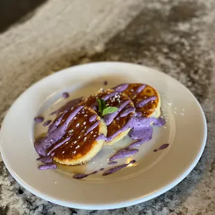 Vanilla pancakes with a blueberry crema and maple bourbon syrup