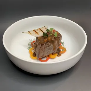 Ribeye with charred onion, mushroom gravy, sweet bell pepper
