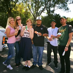 a group of people posing for a picture