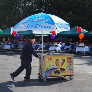 a man pushing a cart
