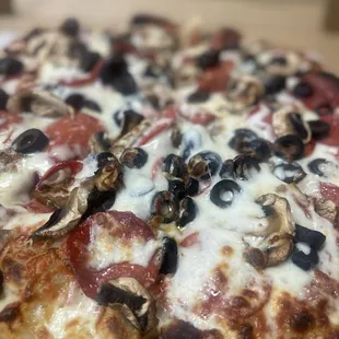 Pepperoni, olives, mushrooms