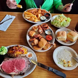 16oz prime rib and the seafood combo and a sampler appetizer