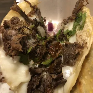 The inside of the 5 Pieces Quesa Birria