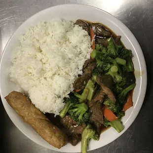 a plate of food with rice and vegetables
