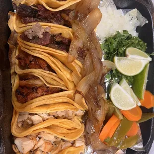 Brisket, al pastor and chicken tacos