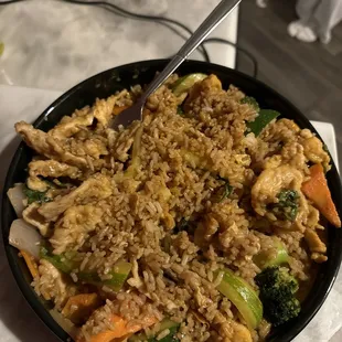 red curry with fried rice not even all the rice in the pick so much food for just like 15-16 bucks allot of chicken too