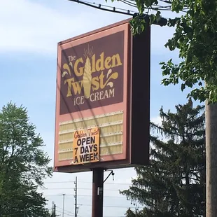 a sign for the golden twist ice cream