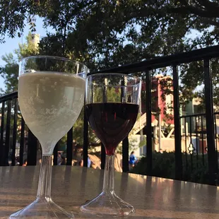 two glasses of wine on a table
