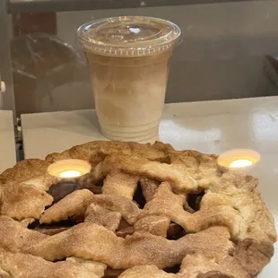 a pie and a cup of coffee