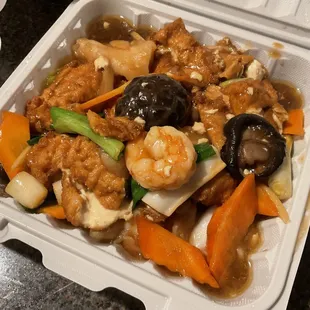 two take out containers of food
