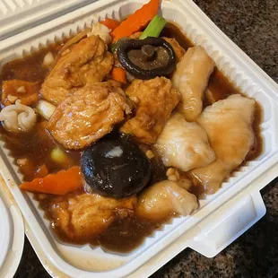 a meal in a styrofoam container