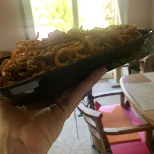 They pile on their dishes.  You will absolutely get what you pay for and then some.