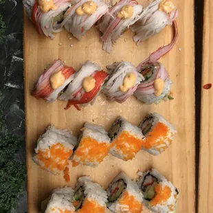 a variety of sushi rolls
