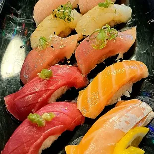 Assorted à la carte sushi , Bluefin Tuna, Fatty Salmon belly, Albacore, Halibut, Fatty Yellowtail belly, Squid, Red Clam.