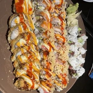 a plate of sushi and rice