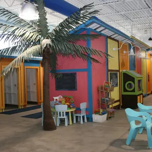 A view toward the changing area and a table for small children to play.