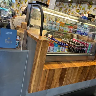a refrigerated display case in a grocery store