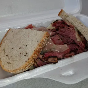 a sandwich in a styrofoam container